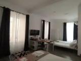 Deluxe Quadruple room with balcony and with city view