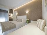 Deluxe Quadruple room with balcony and with partial sea view