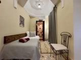 Standard Triple room with courtyard view