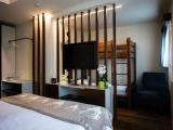 Deluxe Quadruple room with balcony