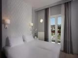 Quadruple room with balcony and with city view