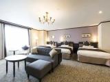 Deluxe Triple Family room with city view