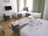 1 Bedroom Deluxe Quadruple room with city view
