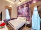 Deluxe Quadruple room with balcony and with city view