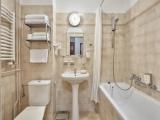 Standard Triple room with courtyard view