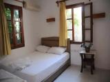 Standard Triple room with garden view