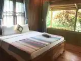 Cottage with balcony and with garden view