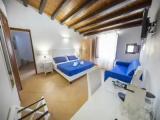 Superior Triple room with balcony and with sea view