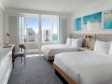Quadruple room with balcony and with partial ocean view