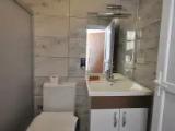 Deluxe Quadruple room with balcony and with partial sea view