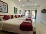 Deluxe Quadruple room with pool view