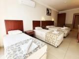 Deluxe Quadruple room with balcony