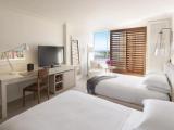 Twin room with partial ocean view