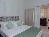 Standard Quadruple room with garden view
