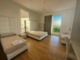 Standard Quadruple room with balcony and with sea view