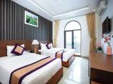 Executive Triple room with balcony and with garden view