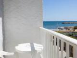 Standard Quadruple room with balcony and with partial sea view