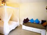 Standard Quadruple room with garden view