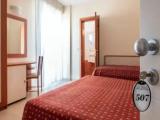 Classic Triple room with balcony and with partial sea view
