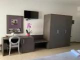 Comfort Quadruple room with balcony and with partial sea view