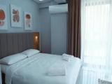 Standard Quadruple room with garden view
