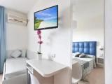 Standard Quadruple room with balcony and with sea view