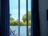 Superior Quadruple room with balcony and with garden view