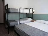 Classic Quadruple room with balcony and with partial sea view
