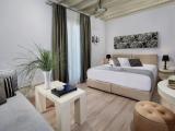 Standard Triple room with garden view