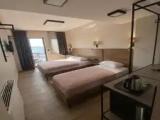 Standard Triple room with sea view