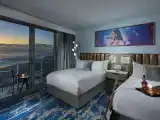 Deluxe Quadruple room with balcony and oceanfront
