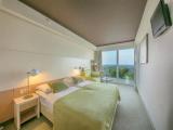 Standard Twin room with balcony and with partial sea view