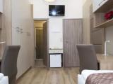 Deluxe Quadruple room with city view