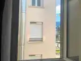 Standard Triple room with courtyard view