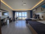 Deluxe Triple room with balcony and with sea view