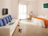 Standard Triple room with balcony and with partial sea view