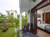 Standard Quadruple Family room with garden view