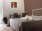 Deluxe Quadruple room with balcony
