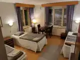 Standard Triple room with sea view