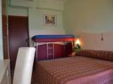 Classic Quadruple room with partial sea view