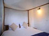 Standard Triple room with garden view