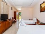 Deluxe Triple room with garden view