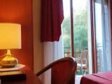 Economy room with balcony and with garden view