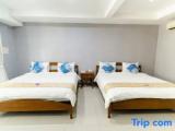 Deluxe Quadruple room with garden view