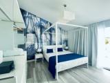 Deluxe Triple room with balcony and with sea view