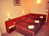 Standard Triple room with balcony and with partial sea view