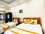 Standard Triple room with garden view