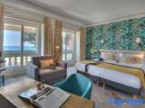 Deluxe Triple room with balcony and with ocean view