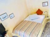 Standard Triple room with garden view