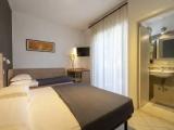 Superior Triple room with balcony and with partial sea view